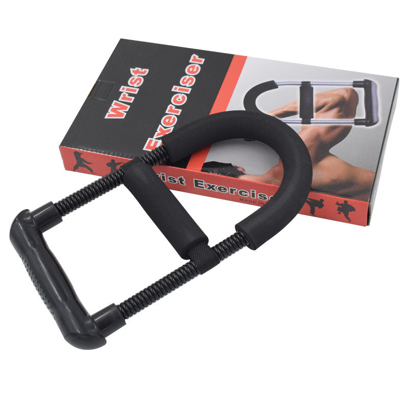 Close-up view of the adjustable resistance spring on the grip strengthener.
